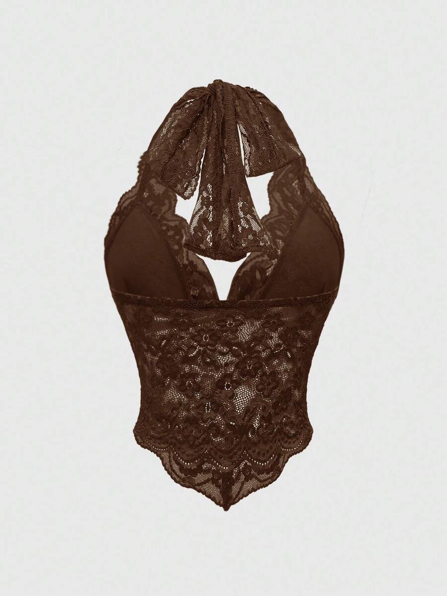 Women's black lace halter neck camisole featuring a backless crop silhouette, contrast lace trim, and scallop hem.