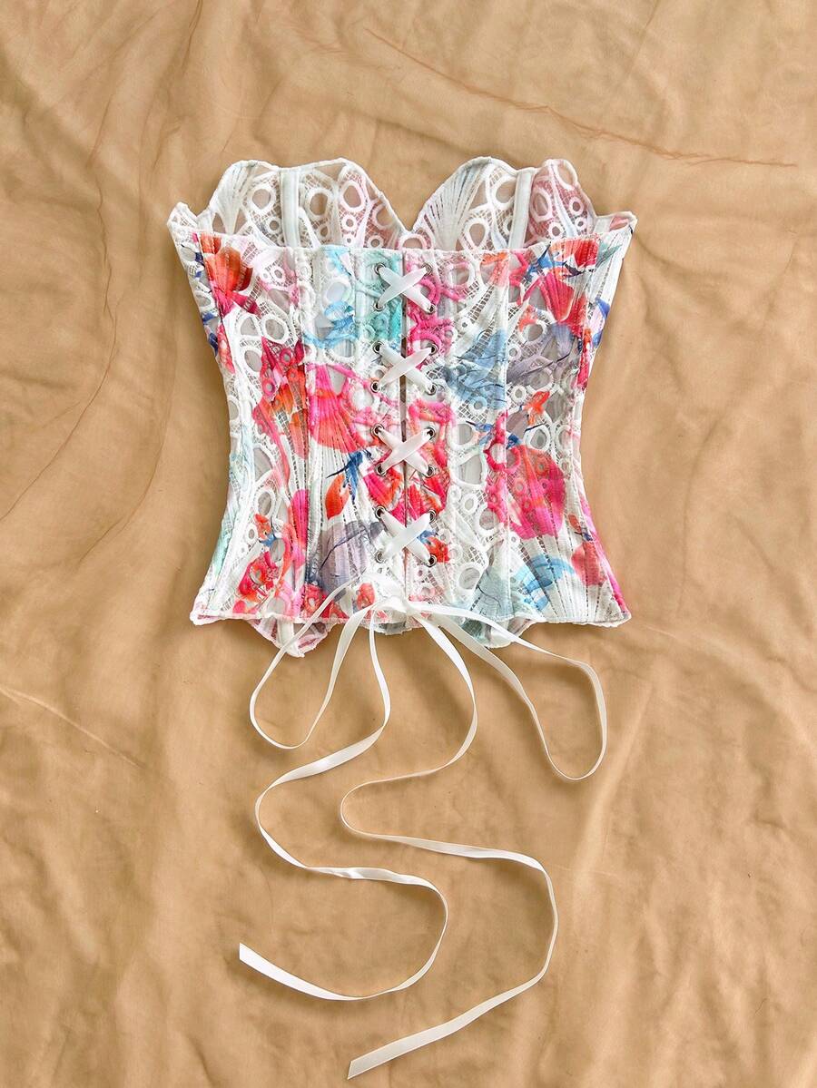 Strapless floral lace corset top with lace-up detail, asymmetrical hem, and slim fit for women.