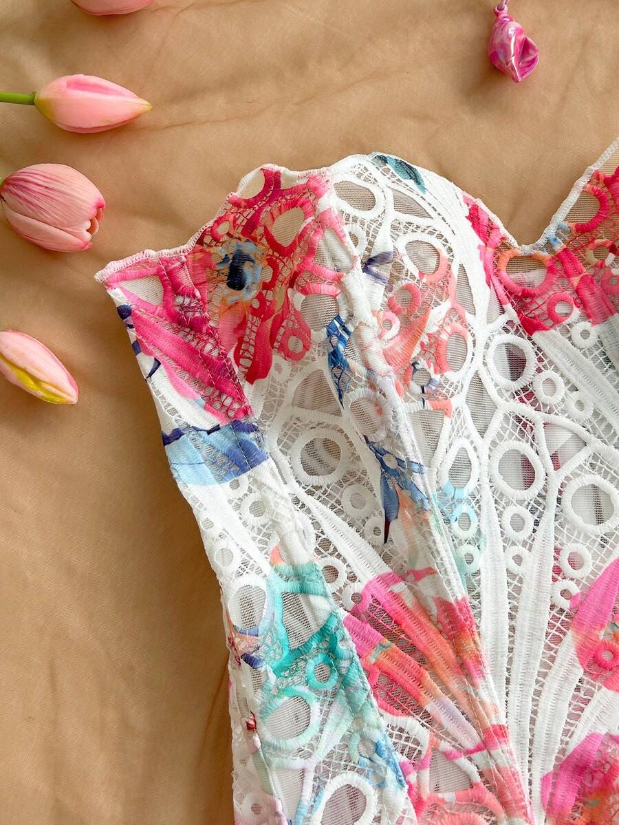 Strapless floral lace corset top with lace-up detail, asymmetrical hem, and slim fit for women.