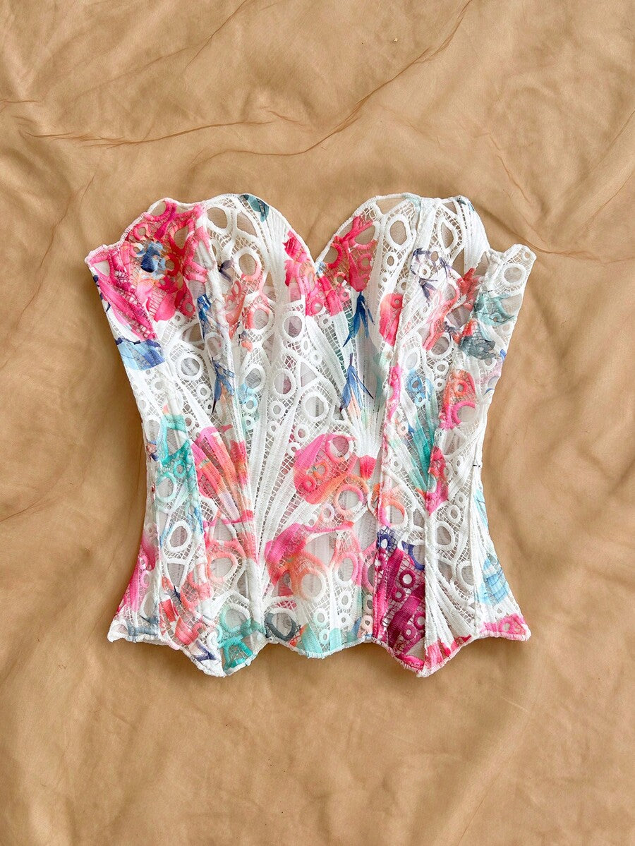 Strapless floral lace corset top with lace-up detail, asymmetrical hem, and slim fit for women.