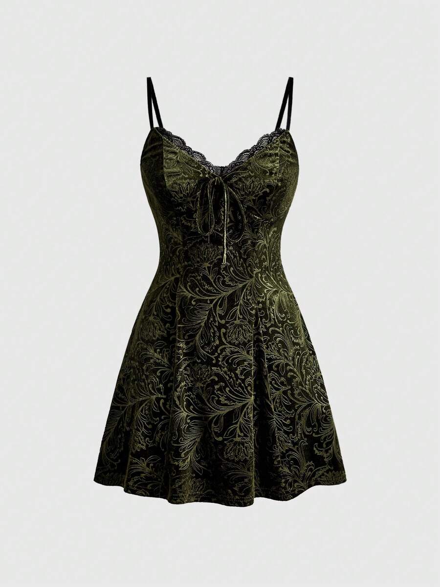 Women's black goth lace patchwork velvet mini slip dress with spaghetti straps, cup detail, high waist, and flared hem.