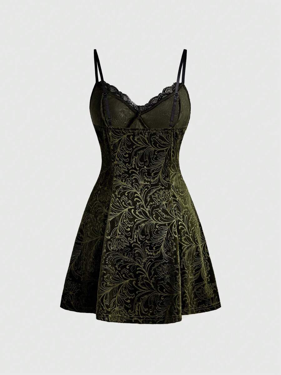 Women's black goth lace patchwork velvet mini slip dress with spaghetti straps, cup detail, high waist, and flared hem.