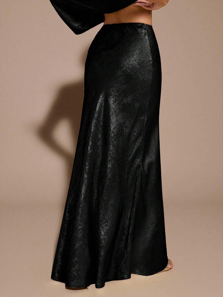 Black low waist extra long mermaid maxi skirt with asymmetrical zipper detail and side slit.