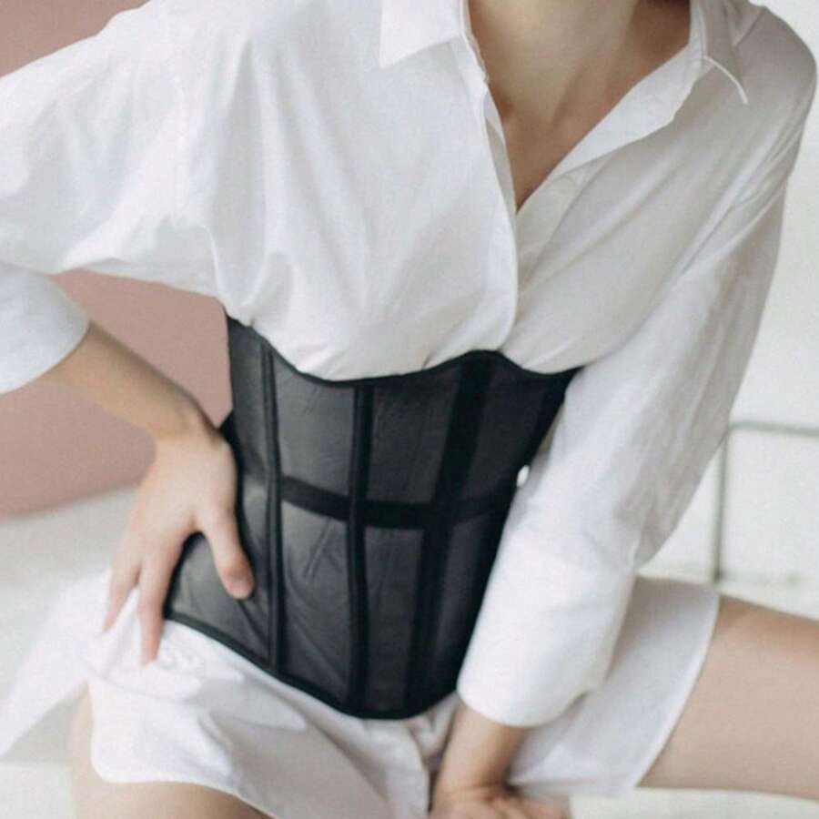 Women's black sheer mesh bustier corset top featuring a vintage slim fit overbust silhouette with subtle floral details.