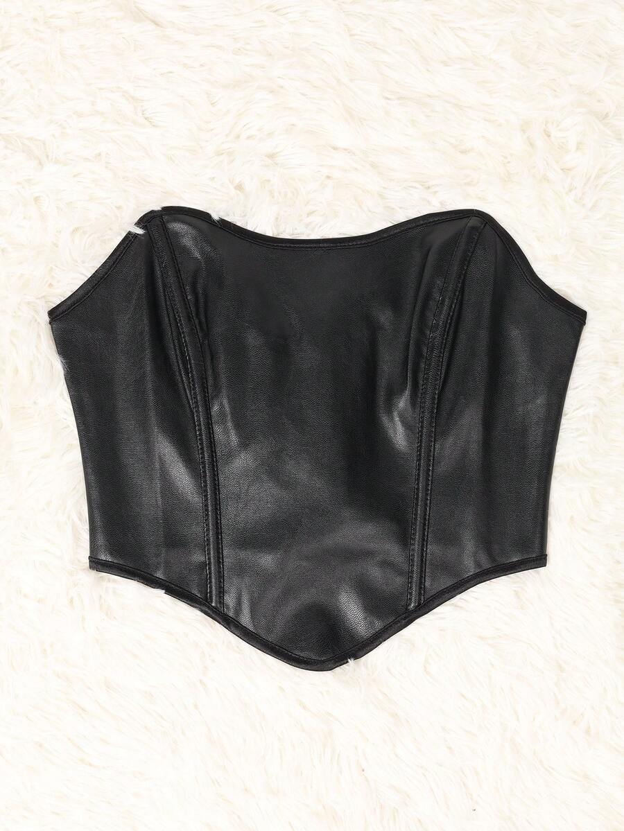 Women's black strapless PU bustier crop top featuring a lace-up back, grommet eyelet details, and an asymmetrical handkerchief hem.