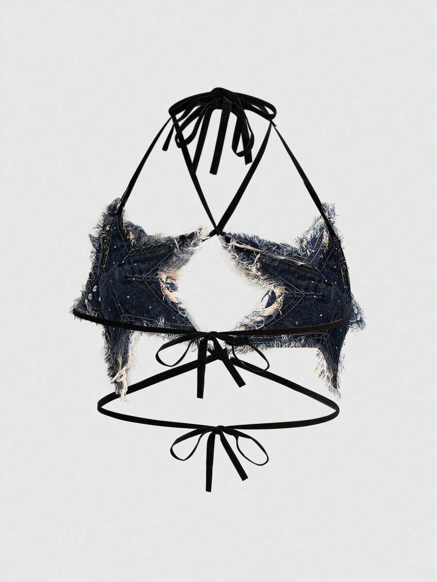 Black denim halter crop top featuring a backless lace-up tie back and star rivet accents for women.