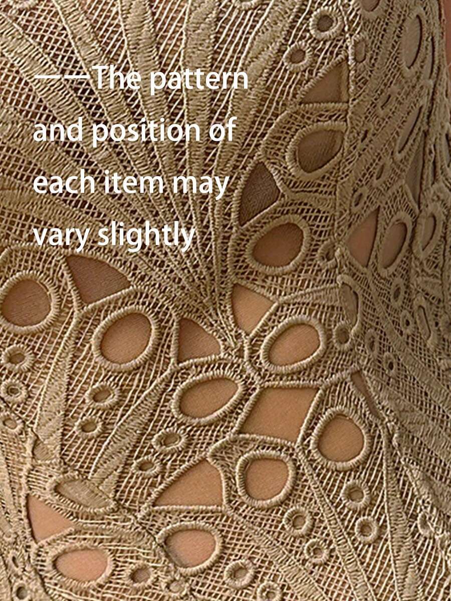 Black lace shaping camisole top with a tie-back detail and grommet eyelet accents, designed for women with slight stretch and ultra-light support.