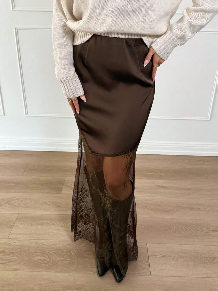 Women's army green lace patchwork maxi skirt with asymmetrical slit, low waist design, and semi-sheer mesh rib-knit details.