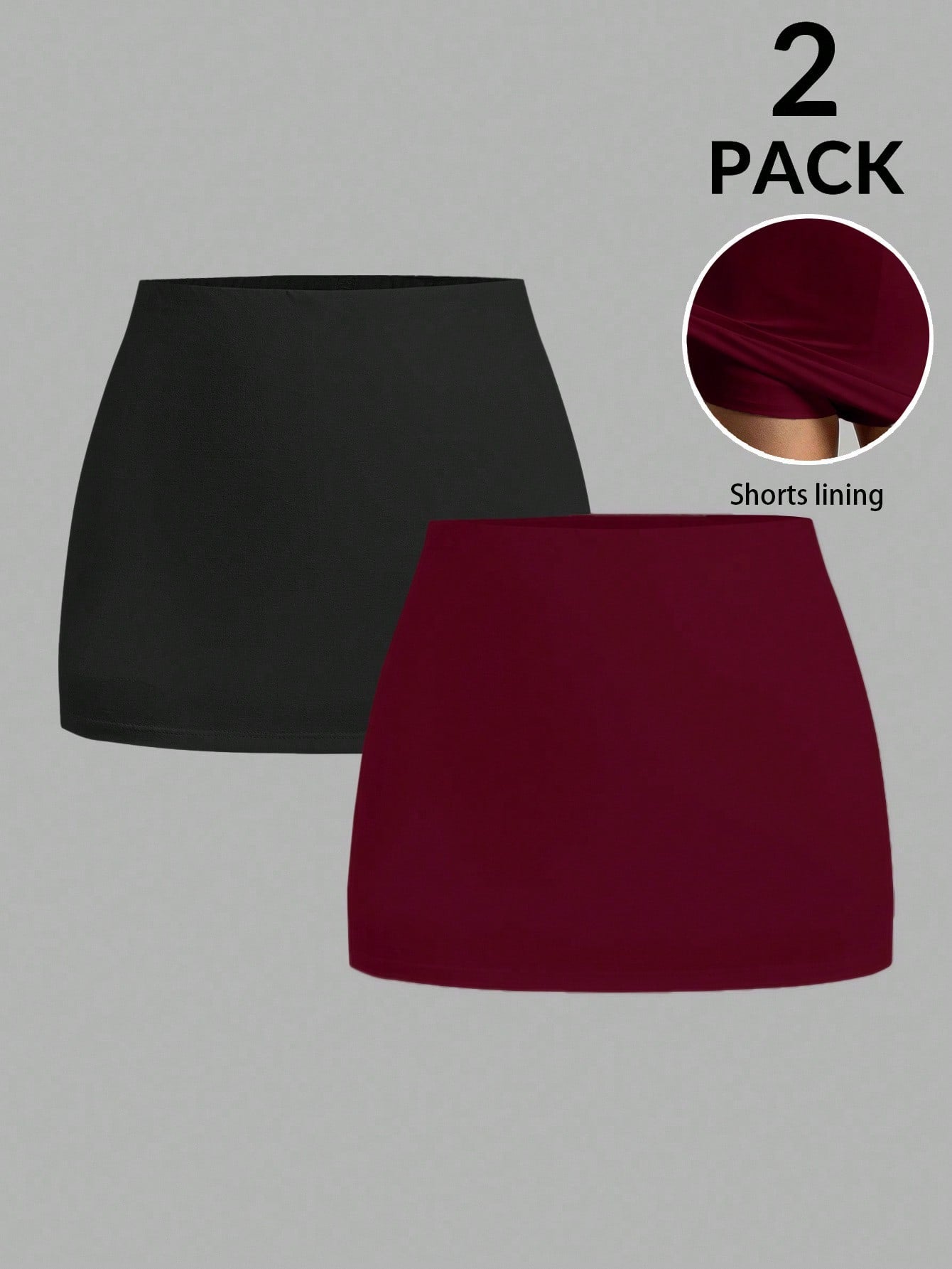 Women's black casual low rise bodycon mini skort with built-in shorts in knitted plain stretch fabric.