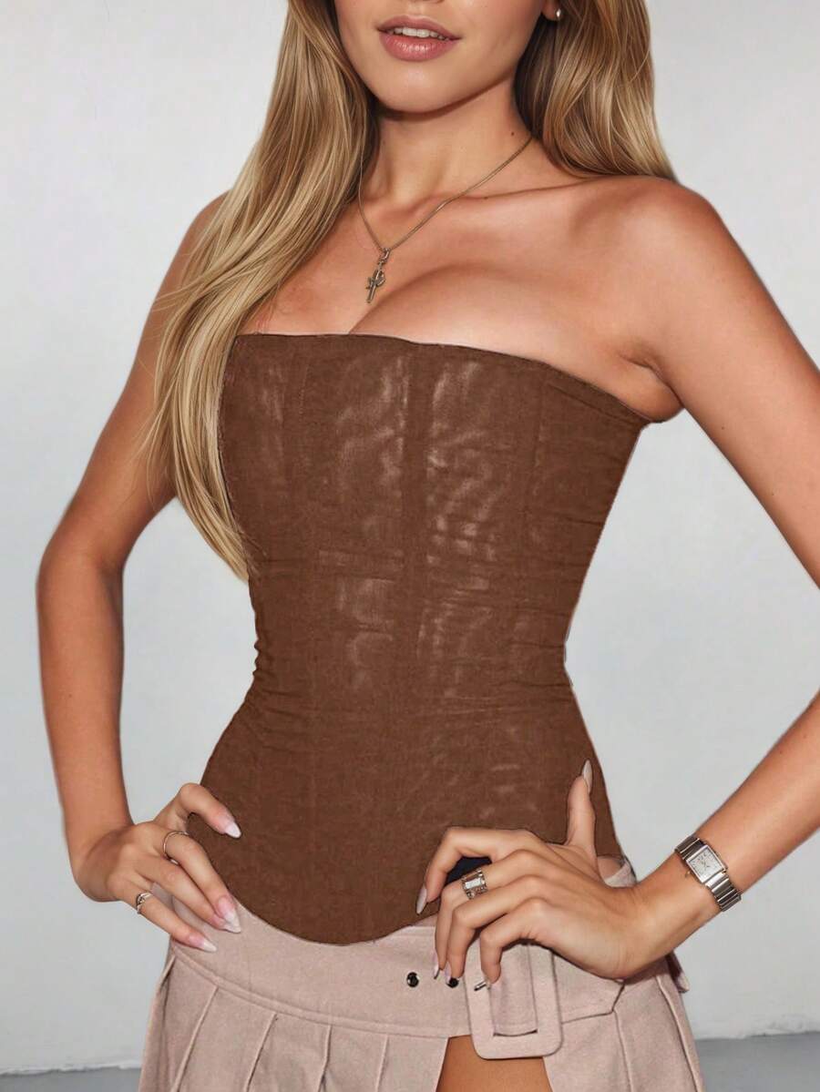 Black strapless mesh bustier top with a backless, semi-sheer design, slim fit, and crop length for women.