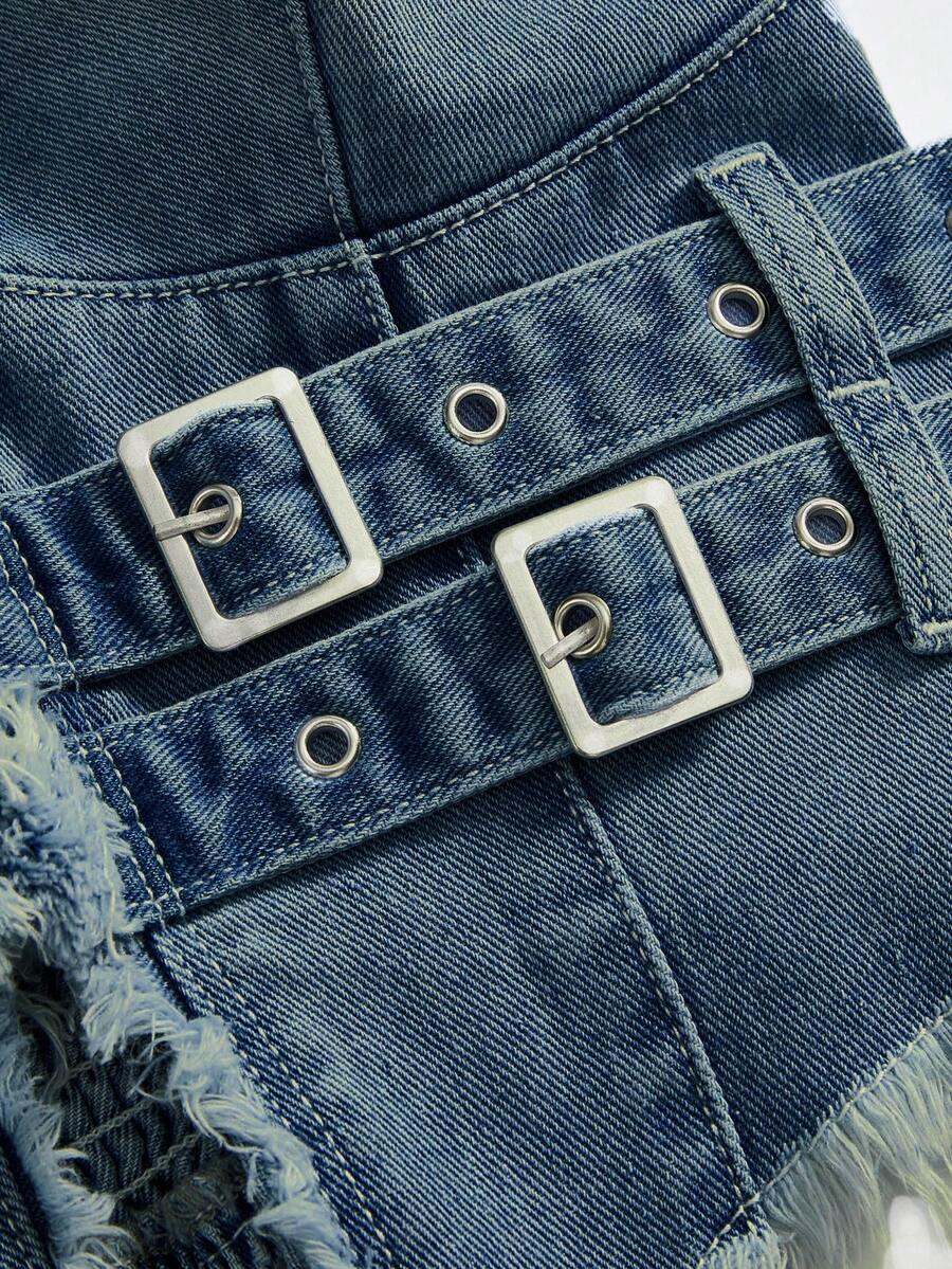 Women's denim halter crop top featuring a backless design, asymmetrical hem, single-breasted front, and lettuce trim.