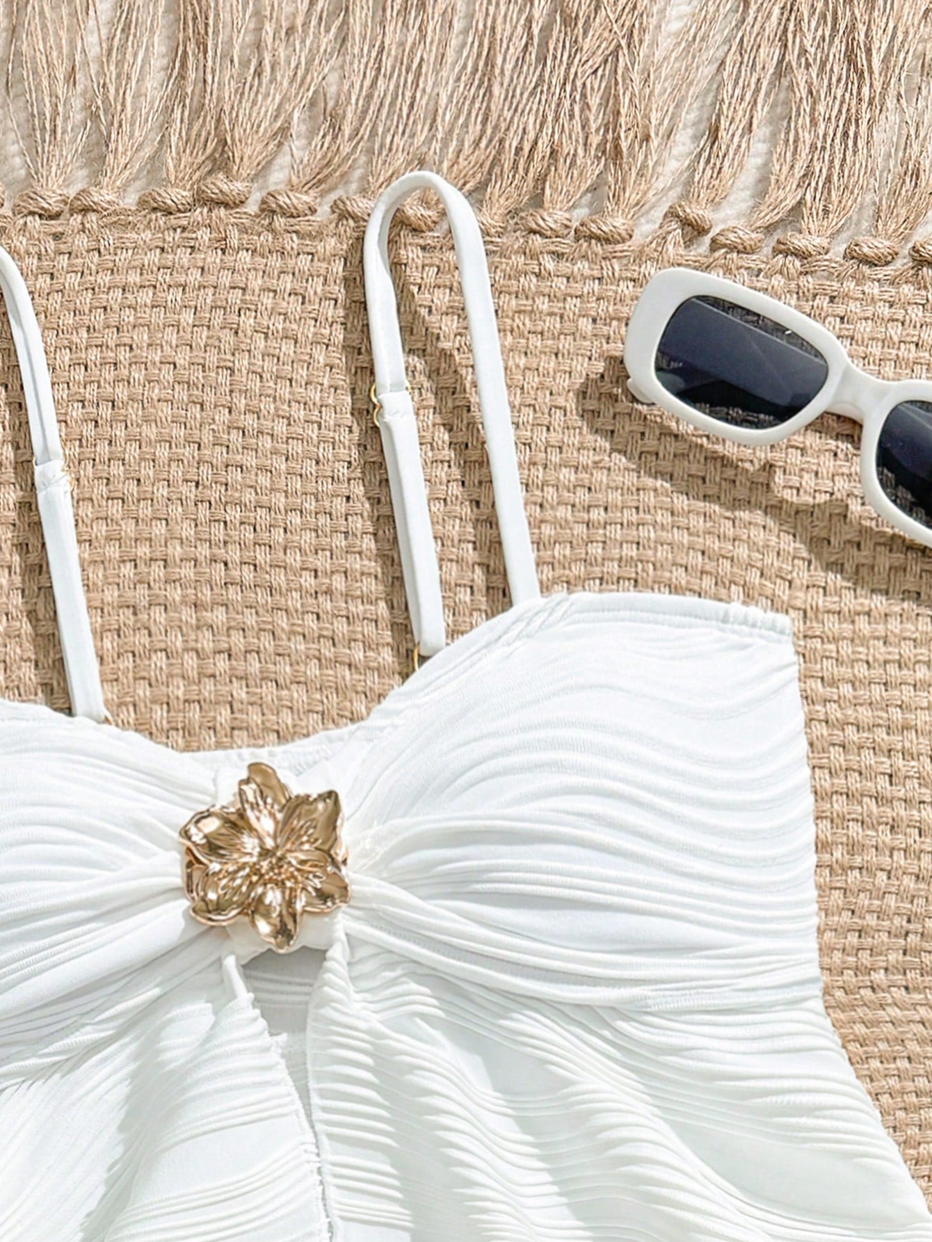 Tween girls two-piece tankini swimwear set with spaghetti straps, asymmetrical design, and 3D rose detail. Features a plant-pattern top and mid-waist bottoms in stretchy fabric for beach or pool wear.