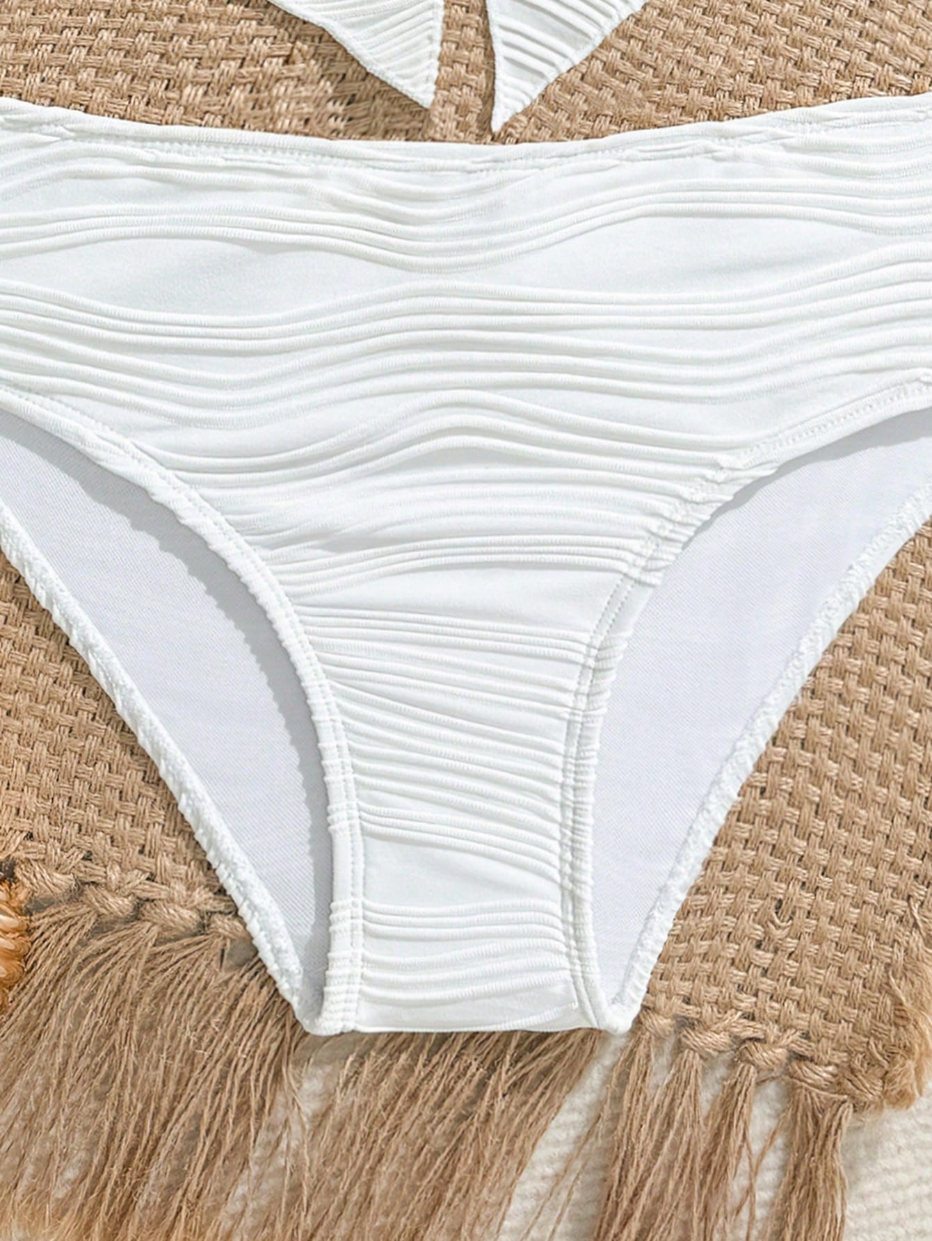 Tween girls two-piece tankini swimwear set with spaghetti straps, asymmetrical design, and 3D rose detail. Features a plant-pattern top and mid-waist bottoms in stretchy fabric for beach or pool wear.