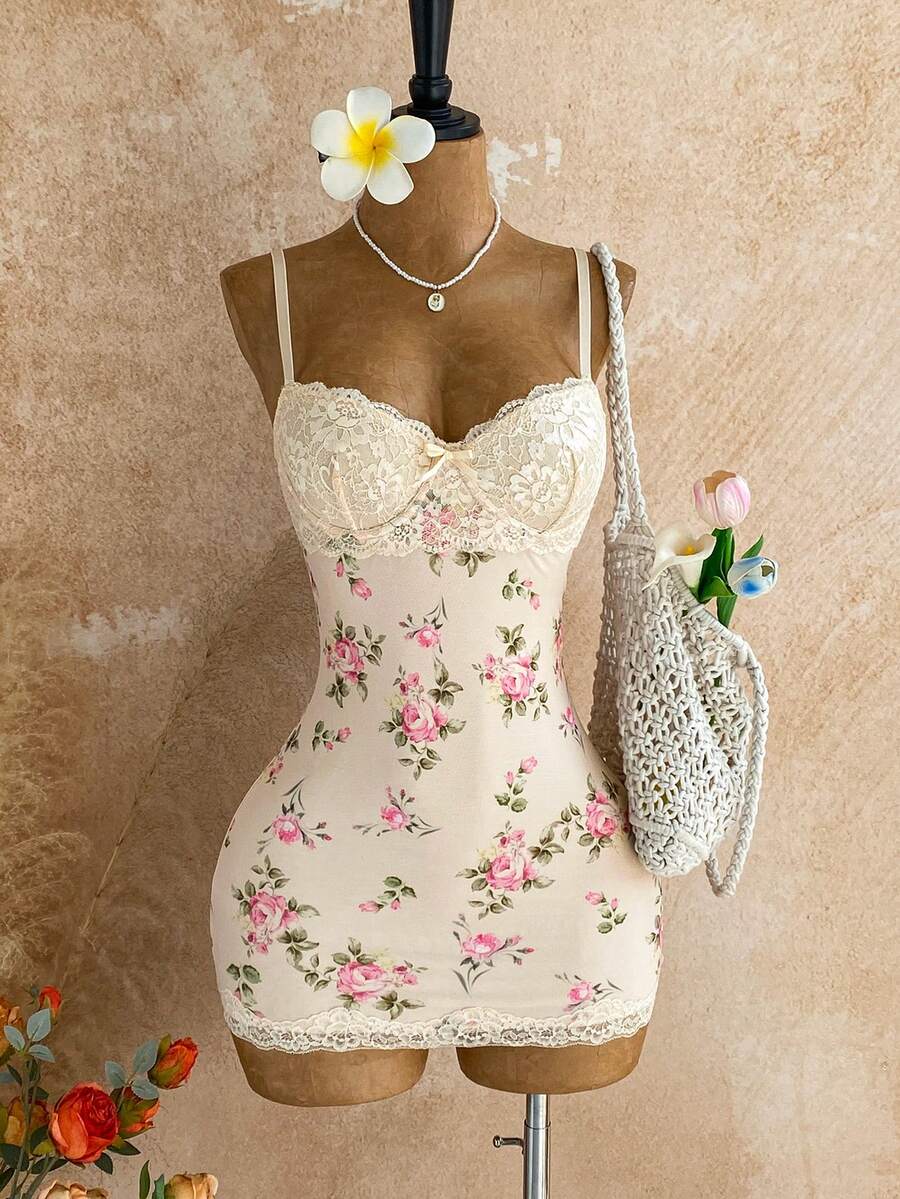 Women's black mesh bodycon mini dress featuring spaghetti straps, contrast lace cup details, backless styling, and a slim fit.