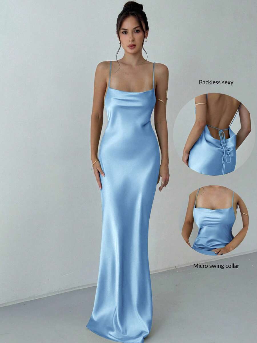 Beige satin backless maxi dress featuring criss-cross spaghetti straps and a mermaid hemline.