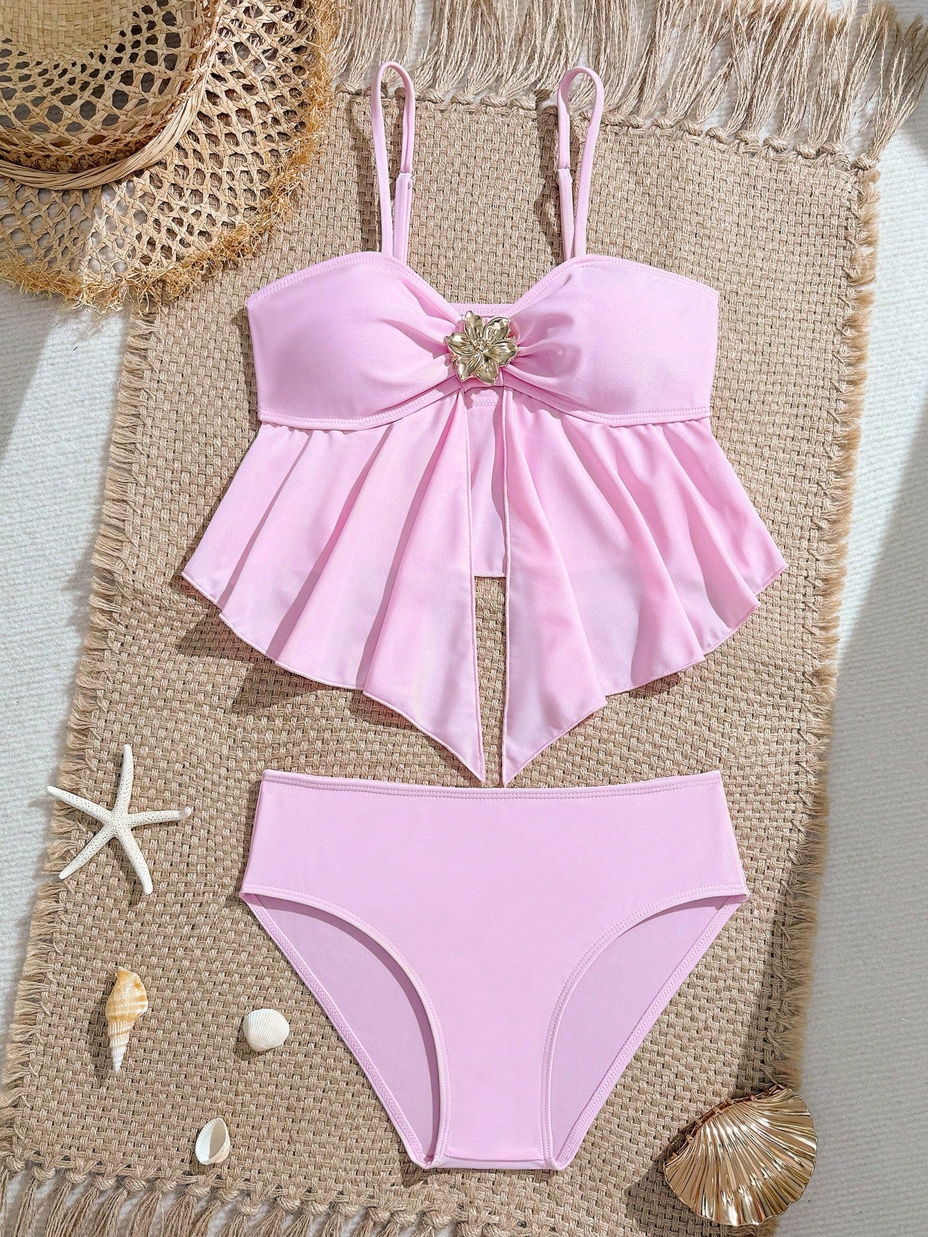 Tween girls two-piece tankini swimwear set with spaghetti straps, asymmetrical design, and 3D rose detail. Features a plant-pattern top and mid-waist bottoms in stretchy fabric for beach or pool wear.