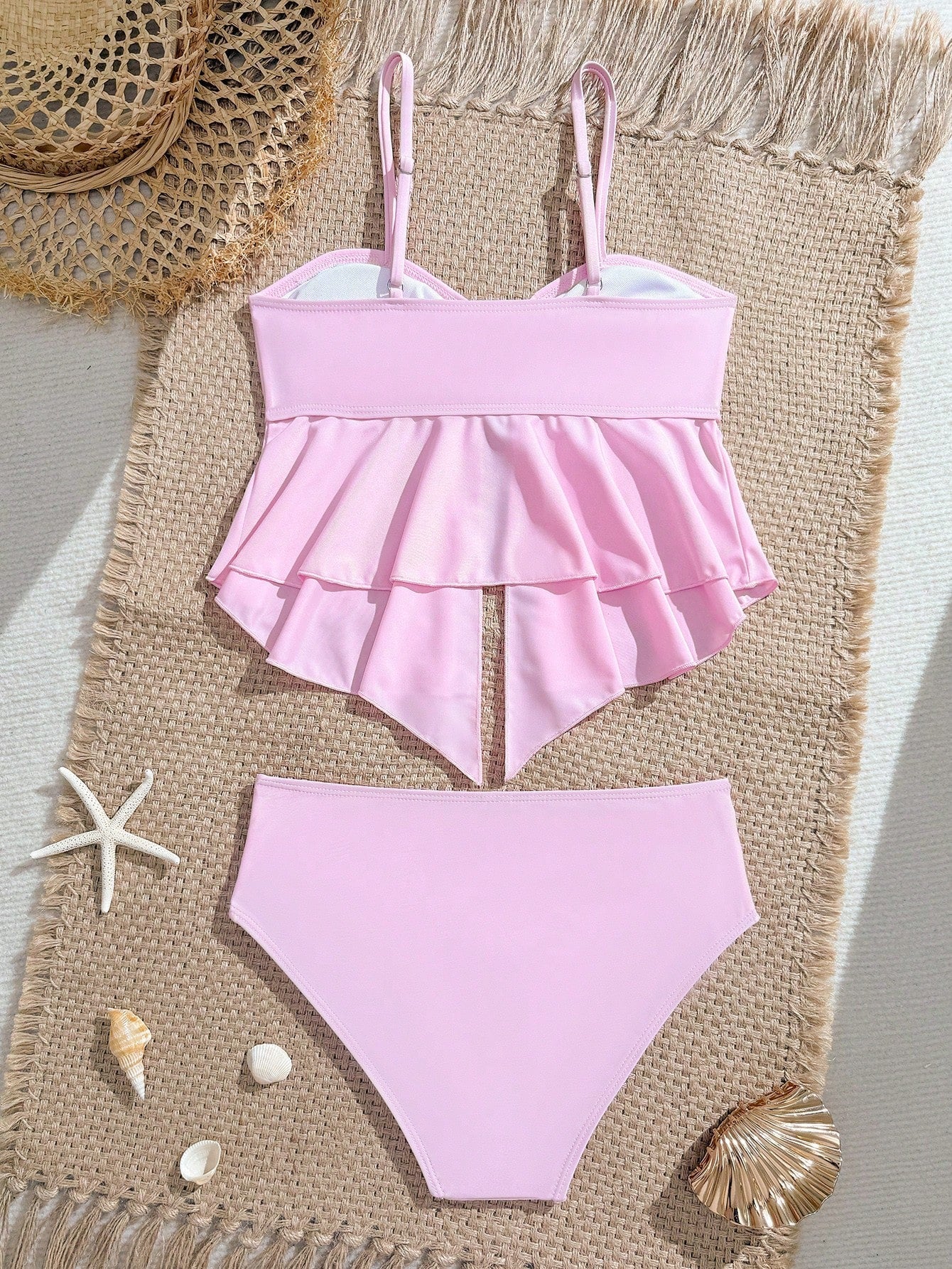 Tween girls two-piece tankini swimwear set with spaghetti straps, asymmetrical design, and 3D rose detail. Features a plant-pattern top and mid-waist bottoms in stretchy fabric for beach or pool wear.