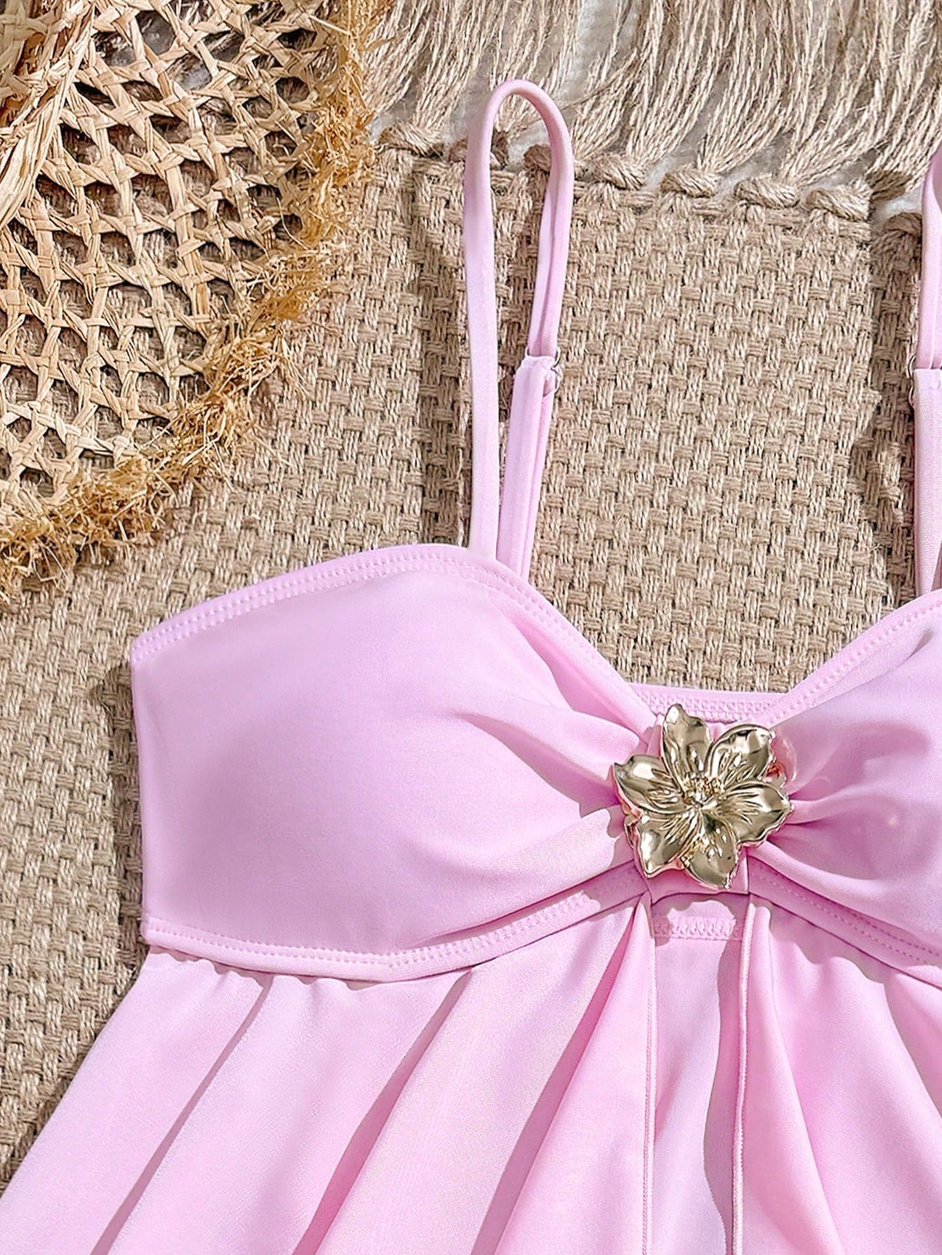 Tween girls two-piece tankini swimwear set with spaghetti straps, asymmetrical design, and 3D rose detail. Features a plant-pattern top and mid-waist bottoms in stretchy fabric for beach or pool wear.