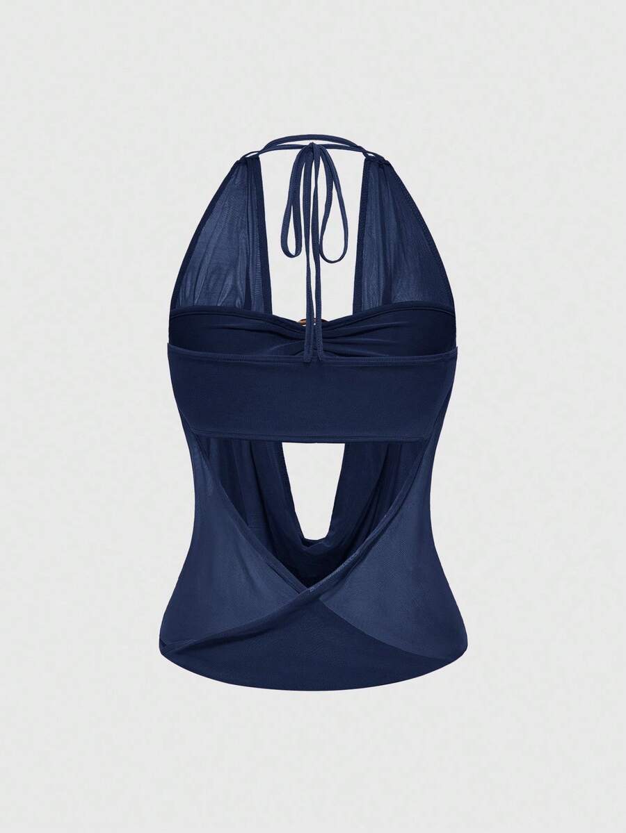 Women's cowl neck halter crop tank top featuring a draped backless design and matching bandeau inner layer.