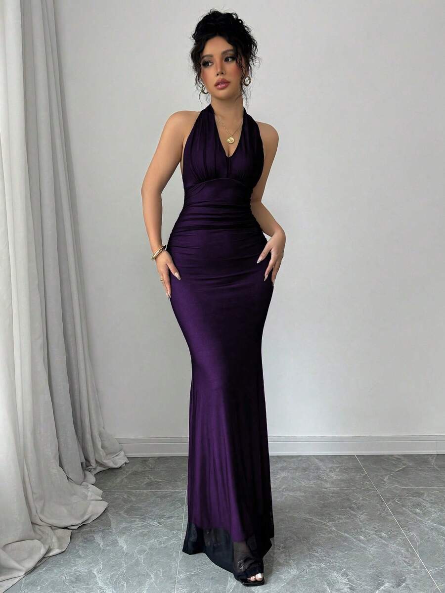 Women's long sleeve mermaid bodycon dress in high-stretch mesh fabric featuring a halter backless neckline, ruched high waist, and slim fit silhouette for formal evening wear.