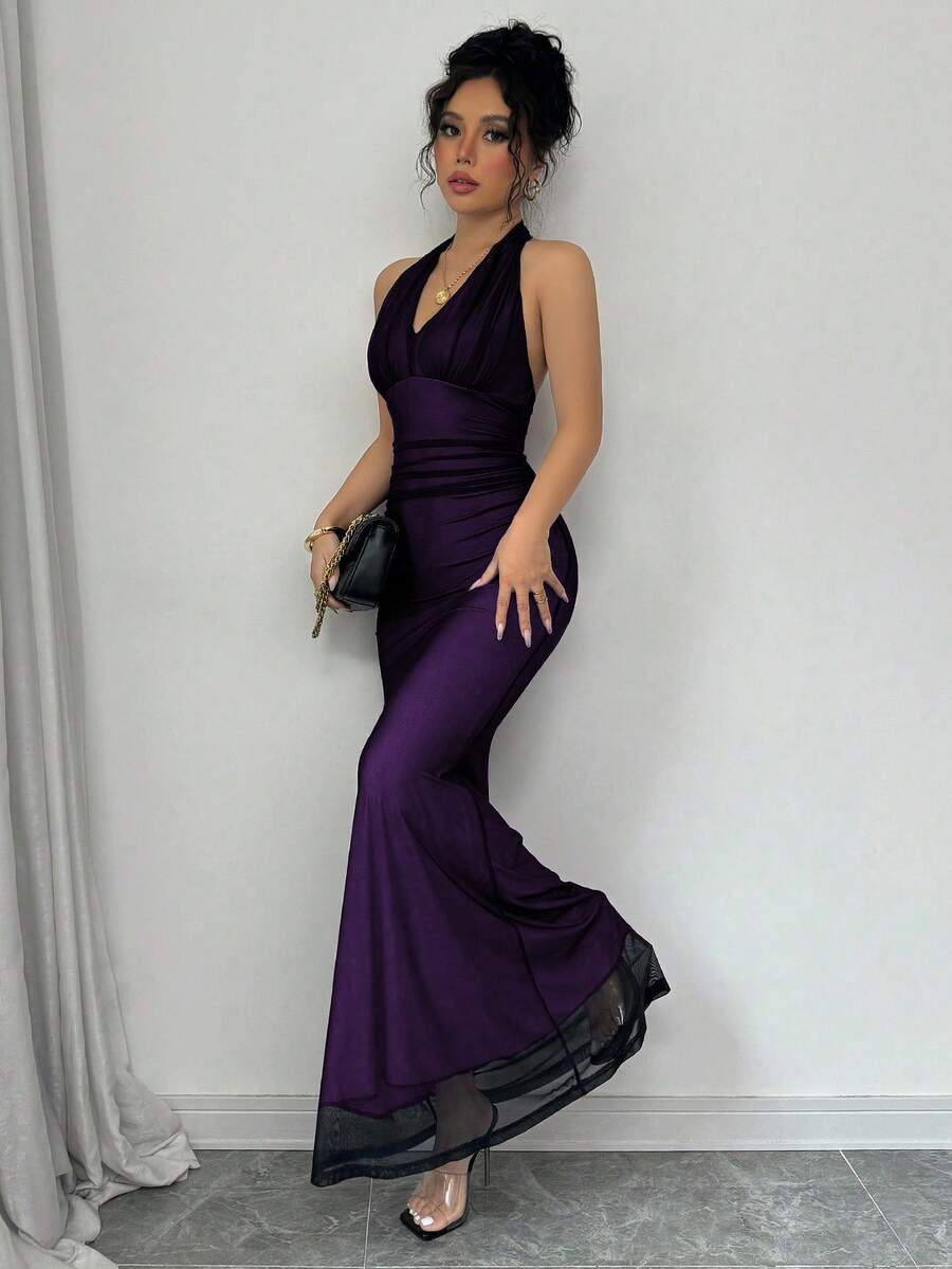 Women's long sleeve mermaid bodycon dress in high-stretch mesh fabric featuring a halter backless neckline, ruched high waist, and slim fit silhouette for formal evening wear.