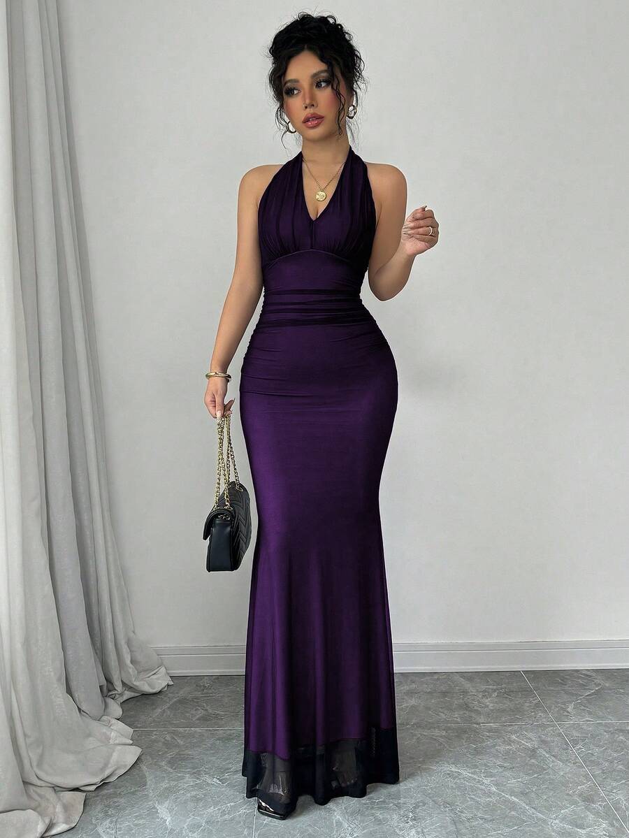 Women's long sleeve mermaid bodycon dress in high-stretch mesh fabric featuring a halter backless neckline, ruched high waist, and slim fit silhouette for formal evening wear.