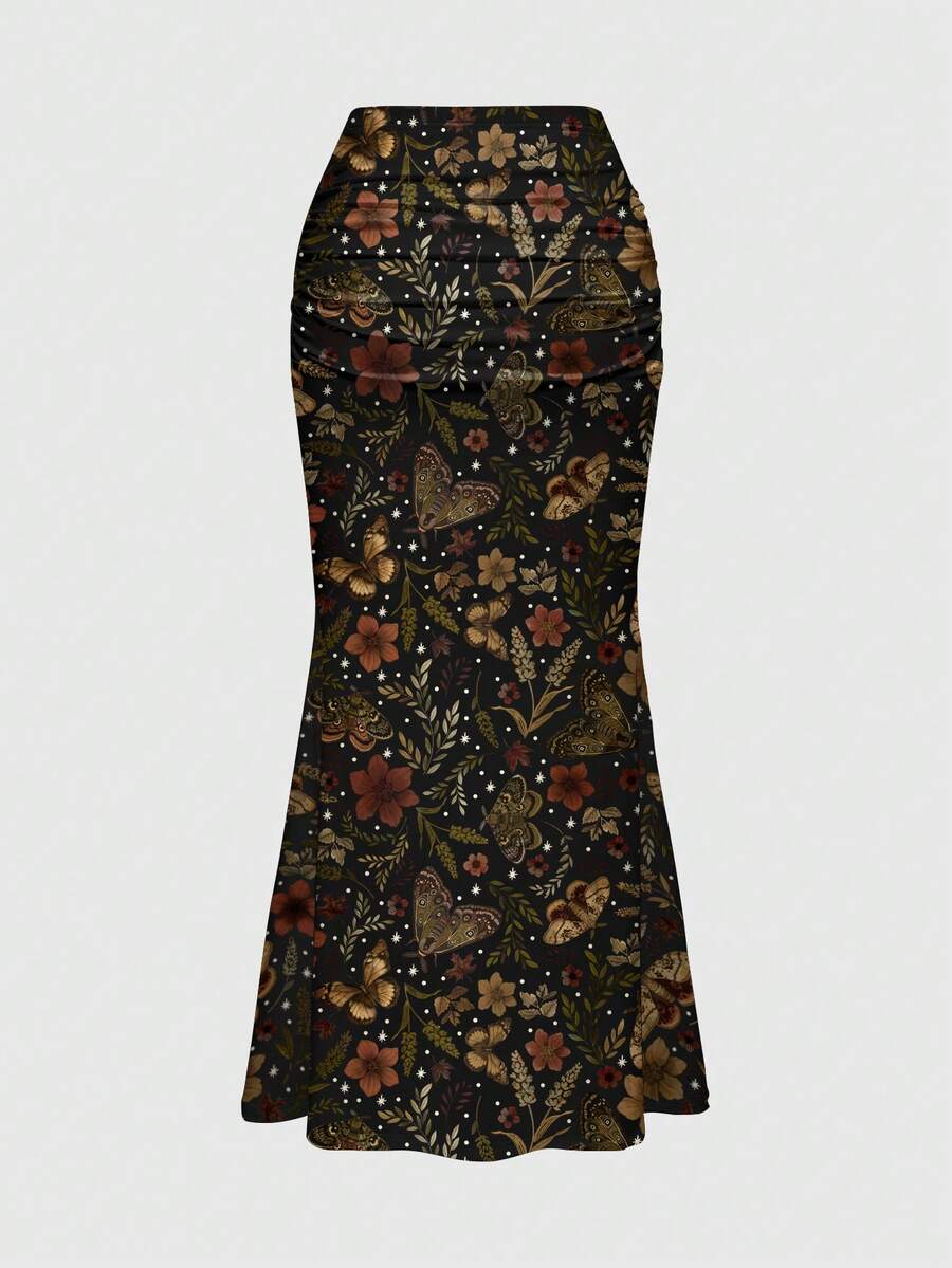Black low waist ruched bodycon maxi skirt with sun and moon full print pattern on high stretch knitted fabric.