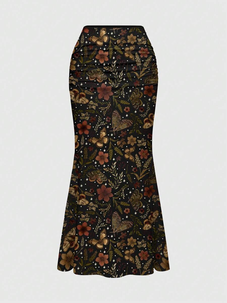 Black low waist ruched bodycon maxi skirt with sun and moon full print pattern on high stretch knitted fabric.