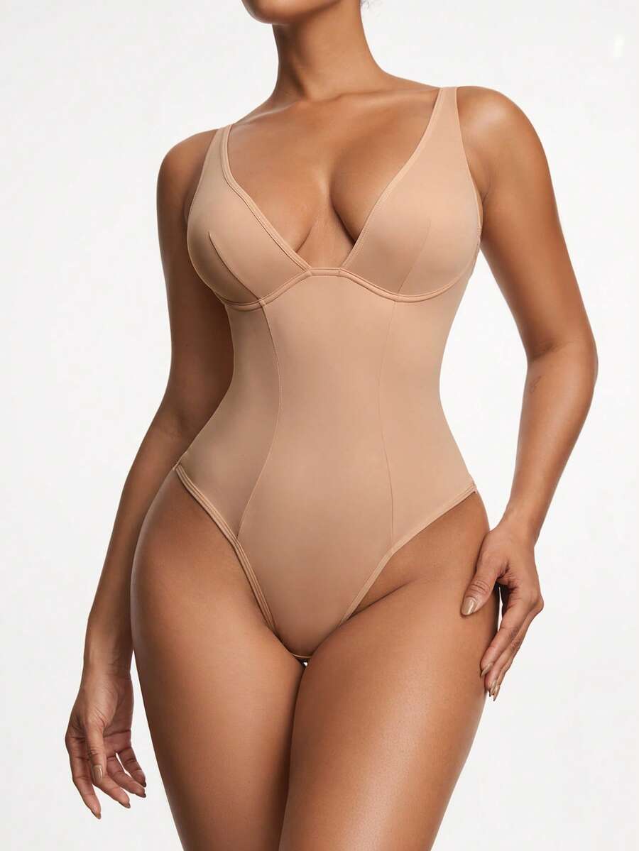 Apricot backless shapewear bodysuit with thong cut, cup details, and high-stretch fabric for light tummy support.