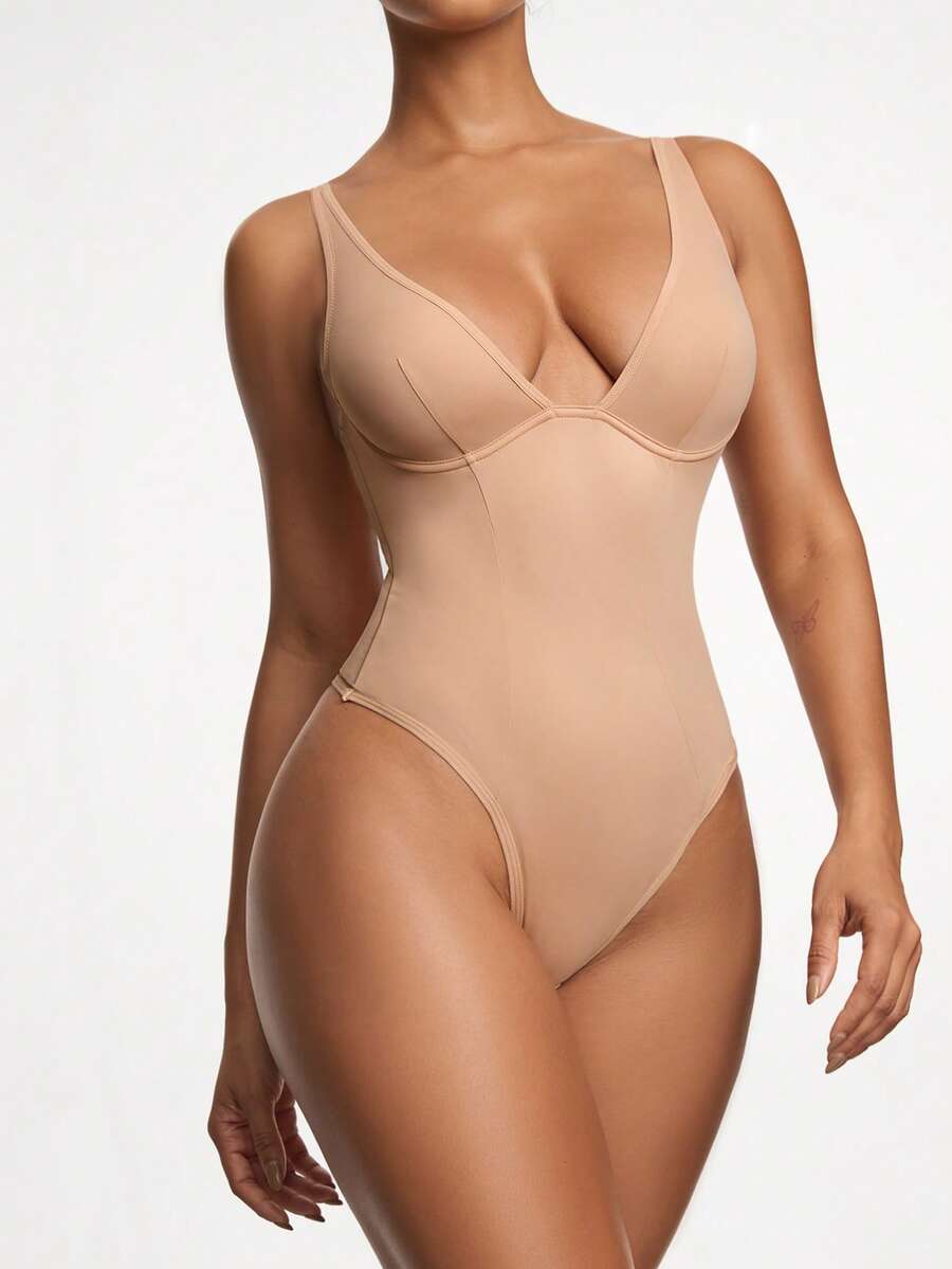Apricot backless shapewear bodysuit with thong cut, cup details, and high-stretch fabric for light tummy support.