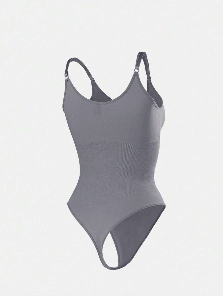 Brown seamless shapewear bodysuit featuring backless design, thong bottom, non-removable padding, and high-stretch fabric for tummy and waist control.