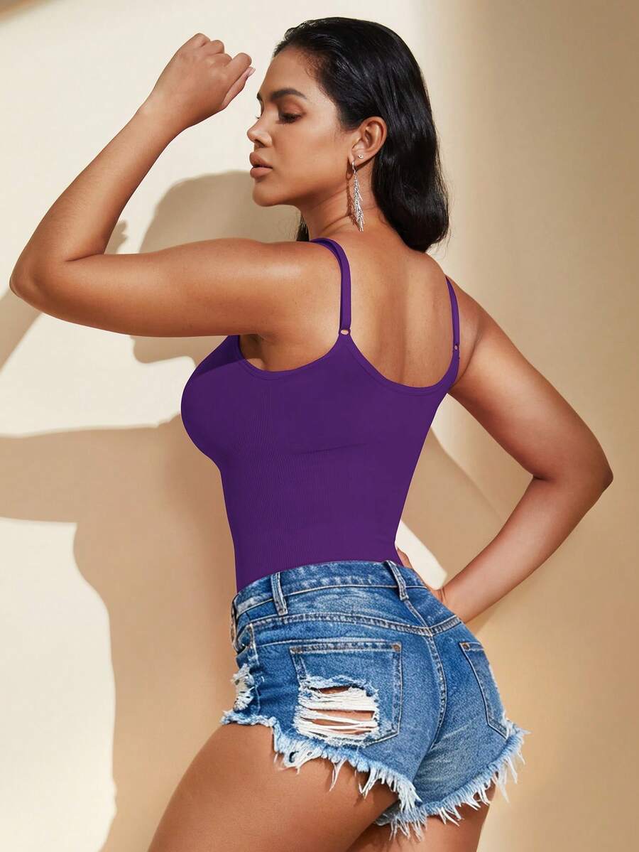 Brown seamless shapewear bodysuit featuring backless design, thong bottom, non-removable padding, and high-stretch fabric for tummy and waist control.