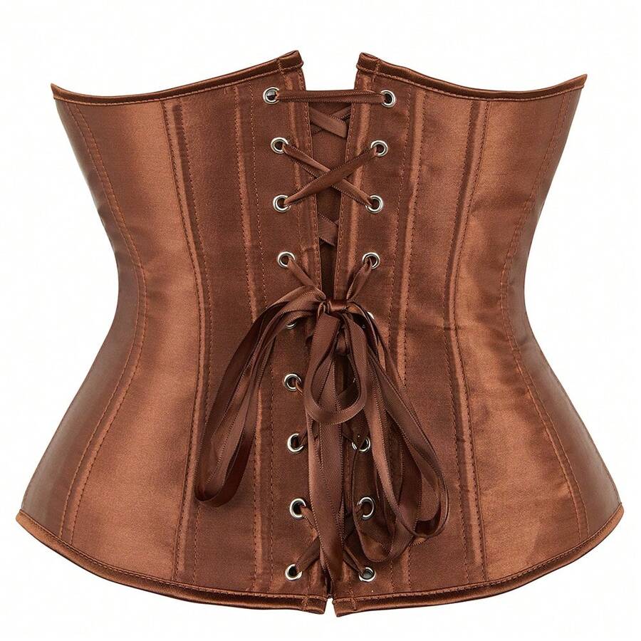 Vintage lace-up waist trainer corset with grommet eyelet details and plant pattern, designed for Halloween styling.