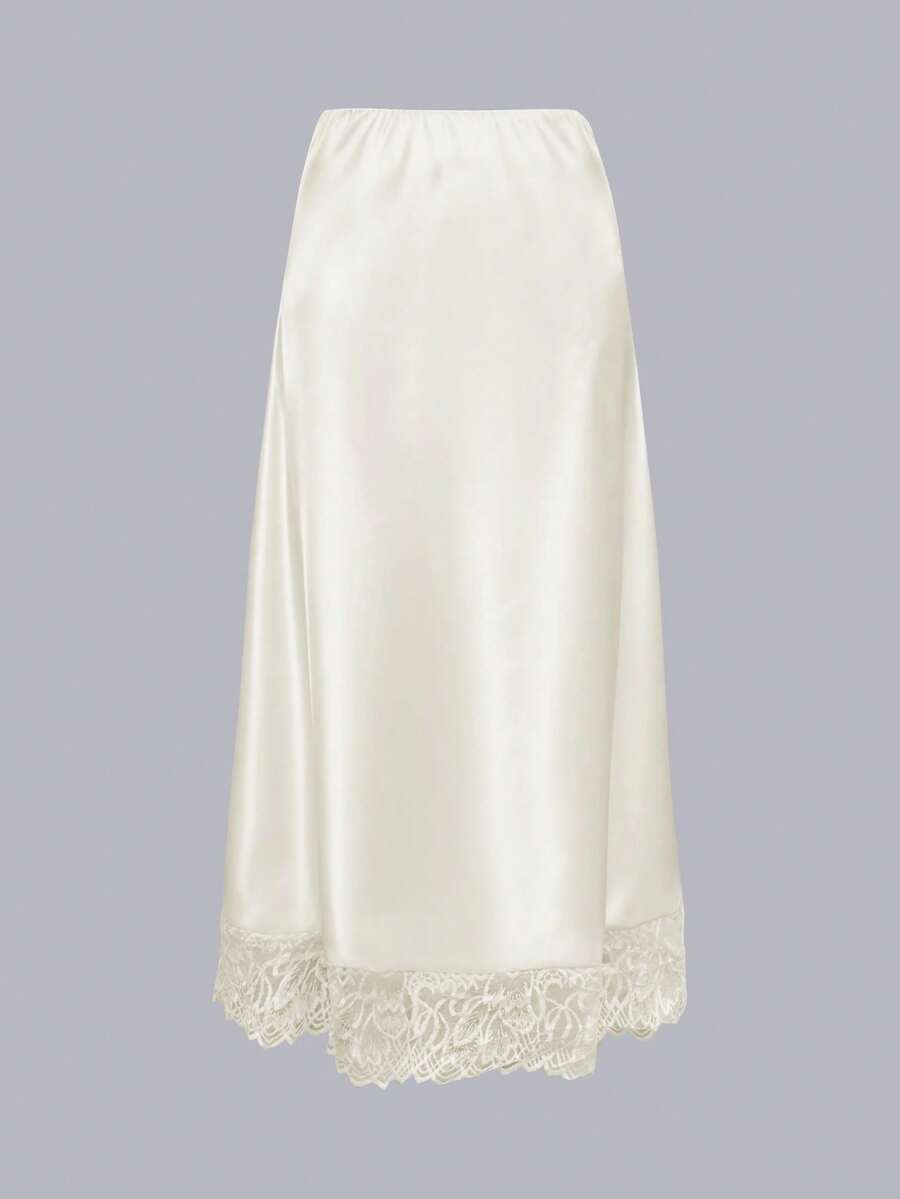 Elegant apricot long satin straight skirt for women featuring an asymmetrical split detail and mid waist fit.