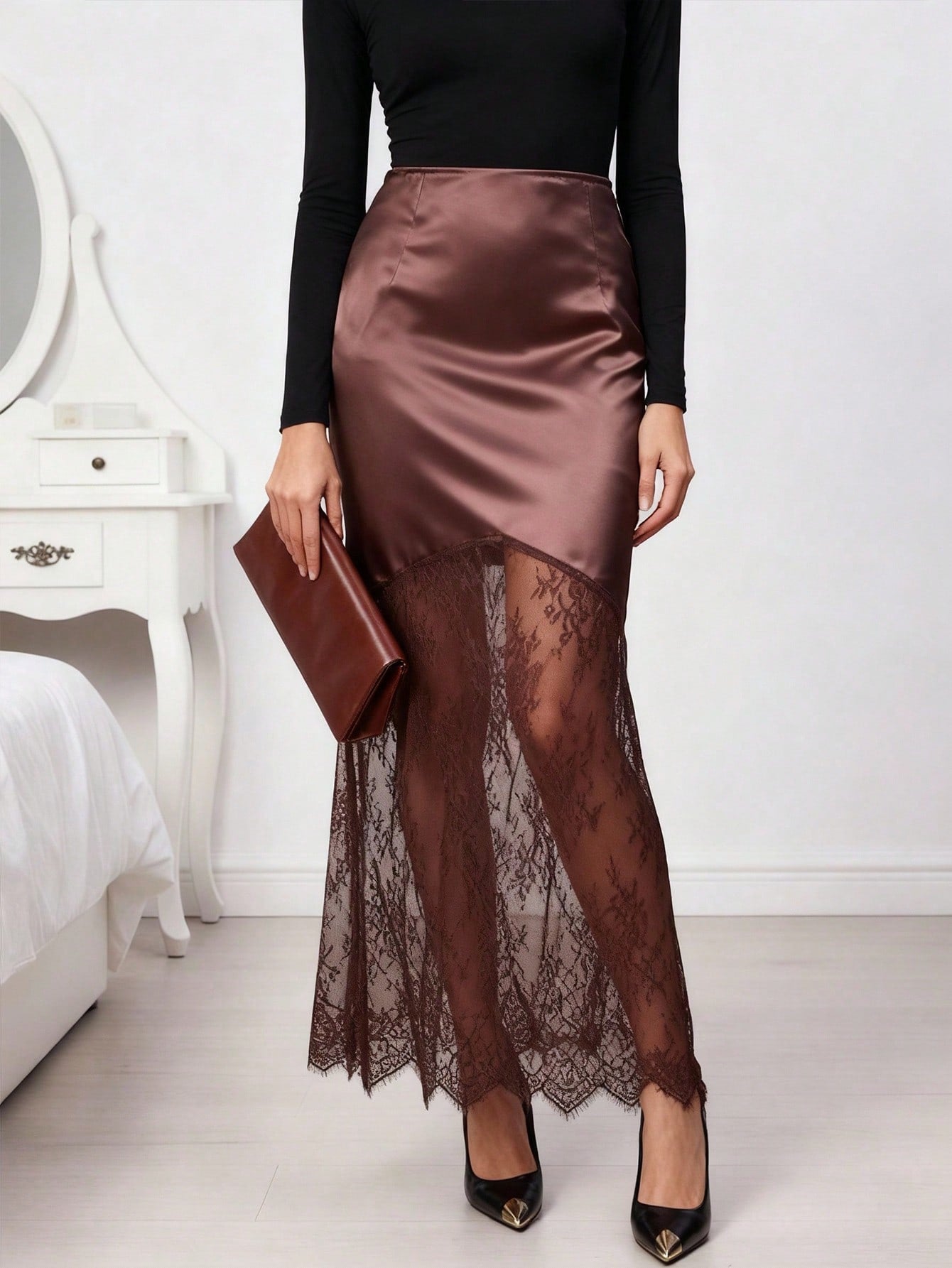 Women's black satin mermaid maxi skirt featuring elegant contrast lace details and zipper closure.