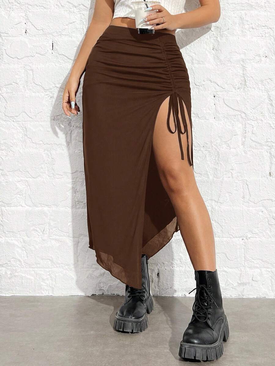 Women's black high-waisted bodycon long skirt featuring a drawstring split thigh detail and mesh fabric.