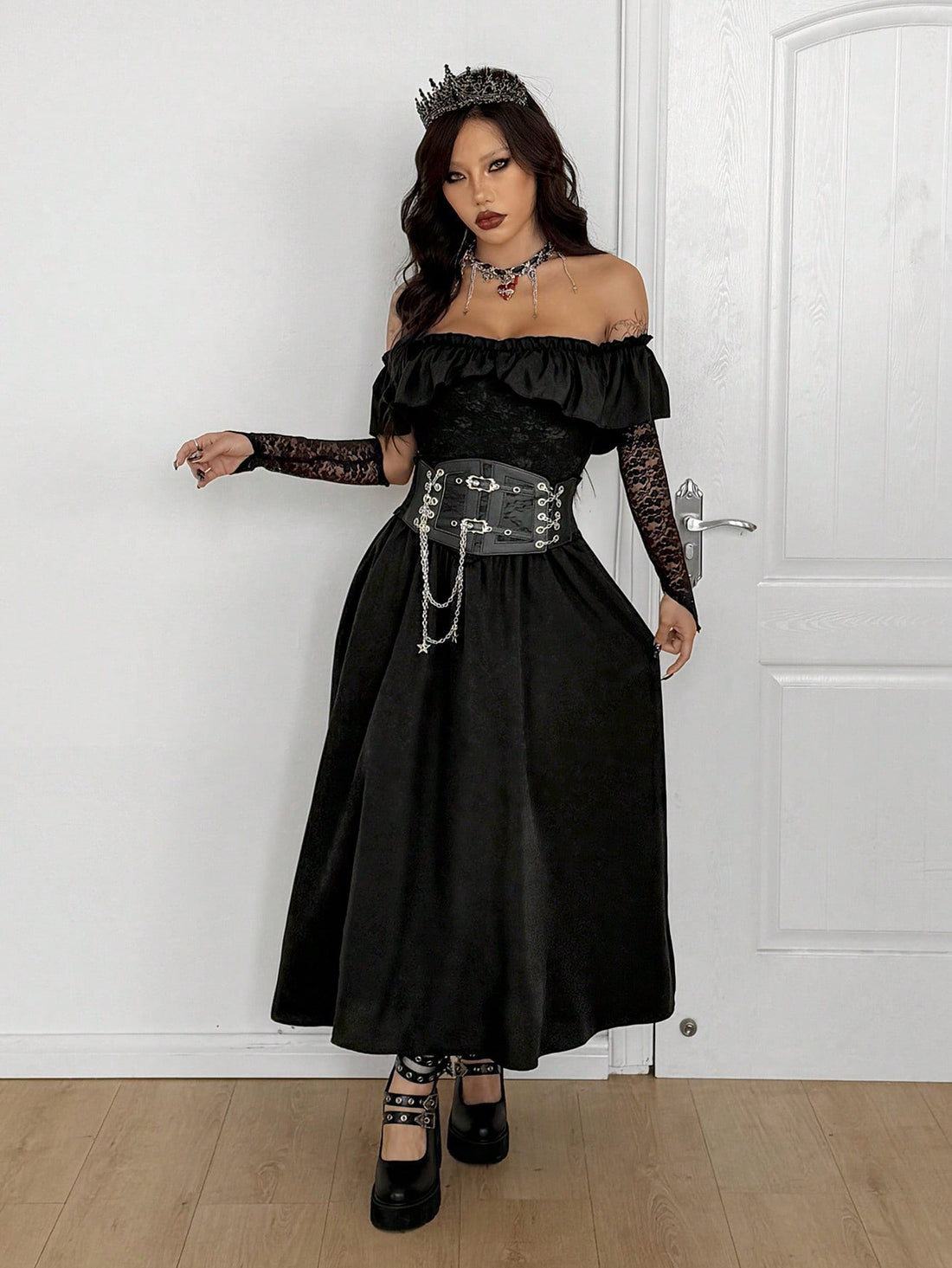 Women's black gothic off-the-shoulder long dress featuring a slim fit A-line silhouette and sleeveless style.