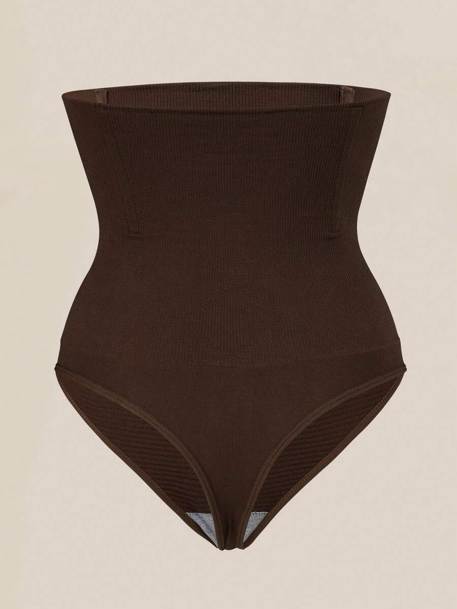 Black high waist seamless tummy control panties for women featuring high-stretch knitted fabric and contrast mesh details.