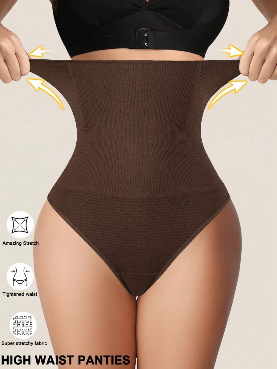 Black high waist seamless tummy control panties for women featuring high-stretch knitted fabric and contrast mesh details.