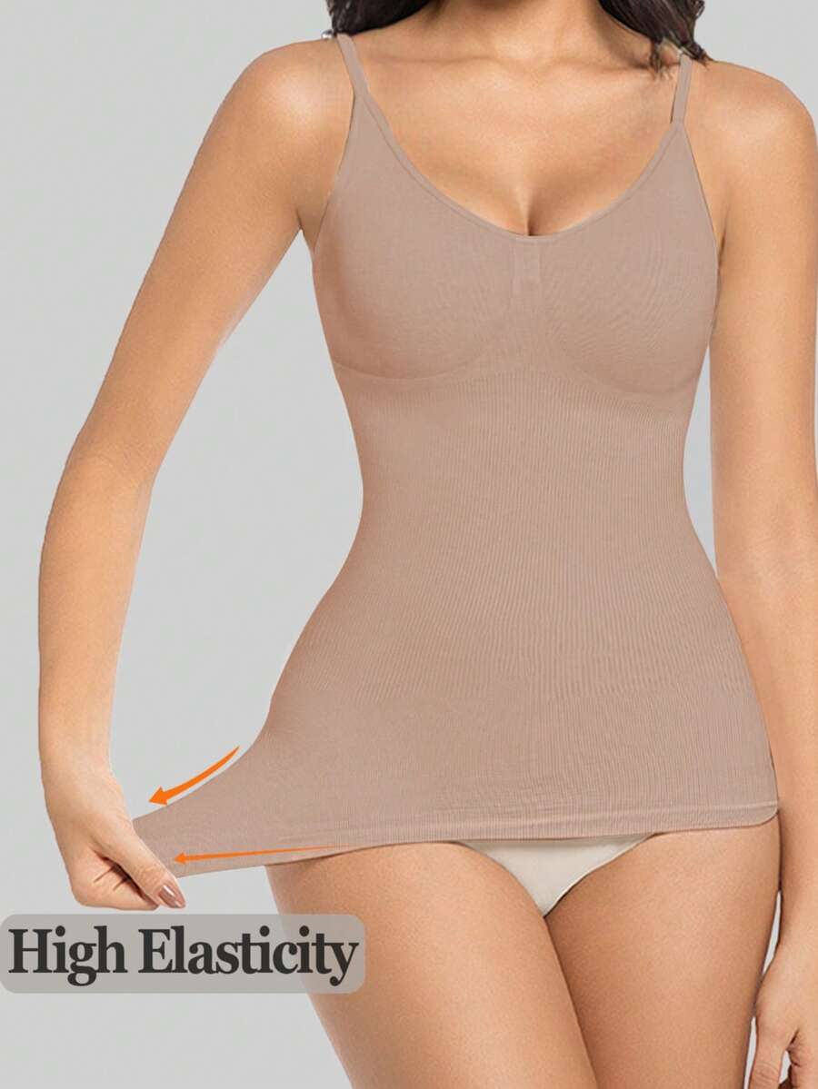 Women's white seamless shapewear crop top featuring adjustable straps and tummy control body shaping design.