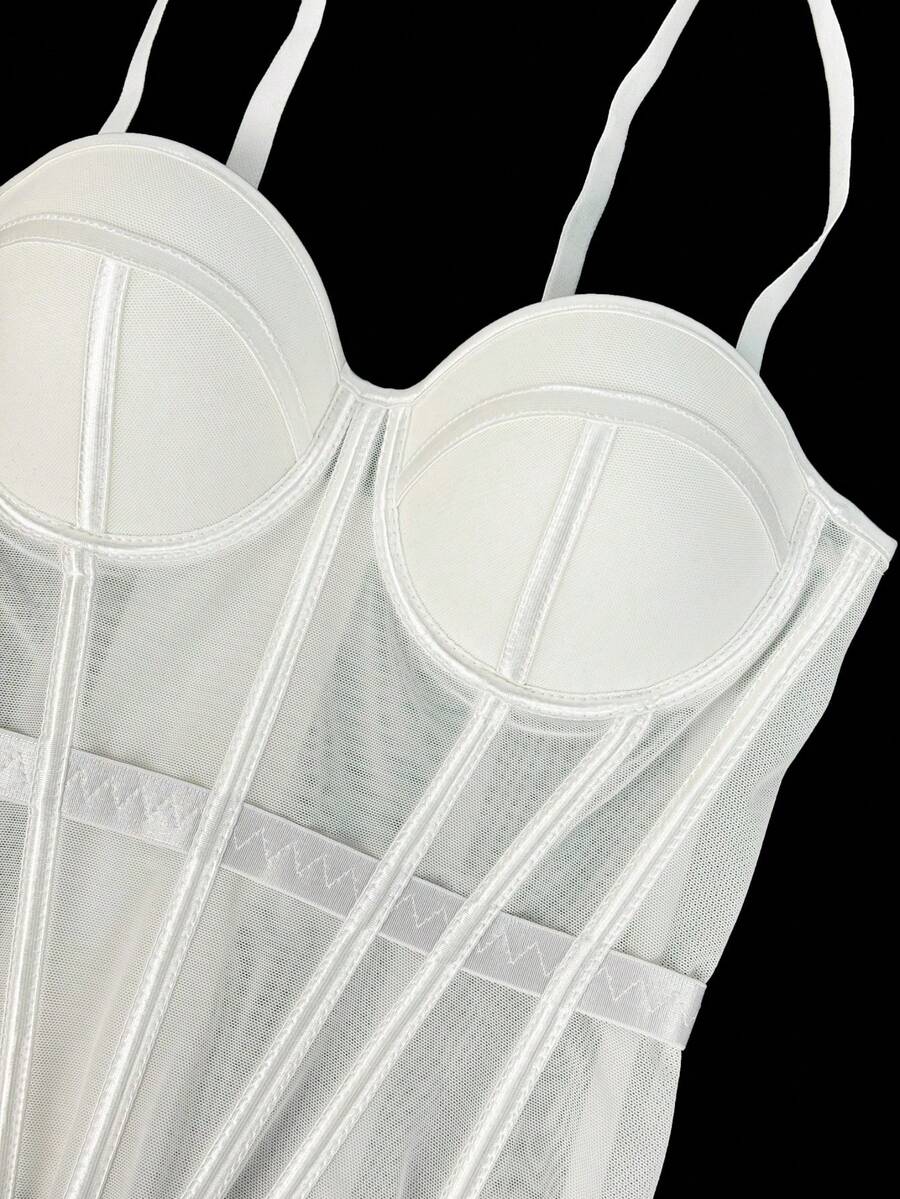 Women's brown backless corset camisole top featuring spaghetti straps, boned structure, and slim fit silhouette.