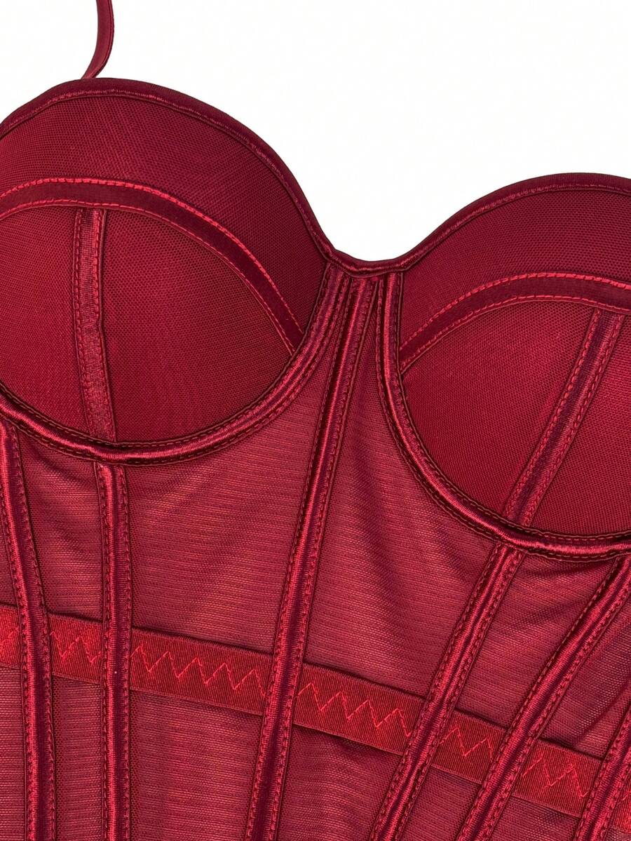 Women's brown backless corset camisole top featuring spaghetti straps, boned structure, and slim fit silhouette.