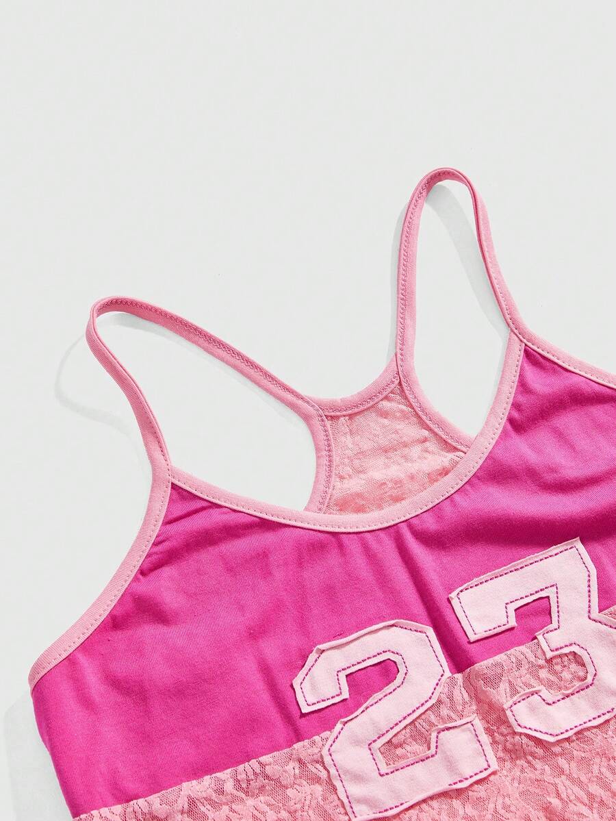 Women's hot pink contrast lace graphic embroidered camisole top featuring spaghetti straps, slim fit micro crop length, and semi-sheer unlined knitted fabric.