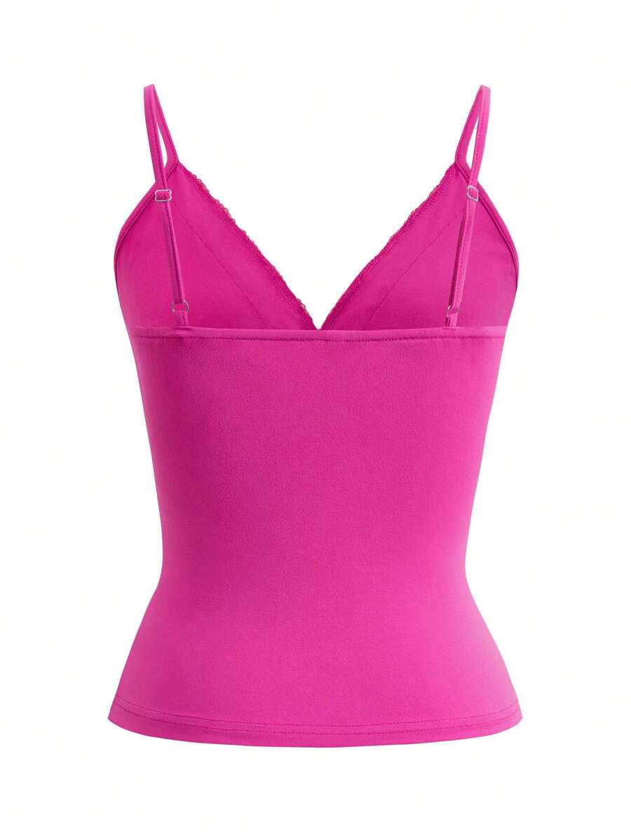 Women's deep V-neck camisole top featuring contrast hollow lace trim, cutout detail, and thin spaghetti straps.