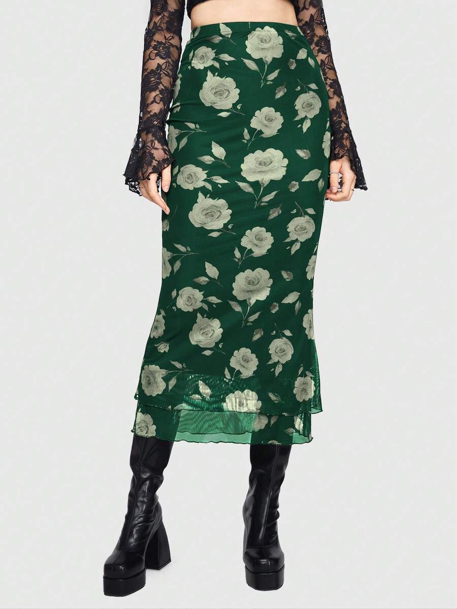 Women's Floral Pattern Mesh Skirt in black featuring a high waist, long mermaid cut, side split, and ruffle lettuce trim.