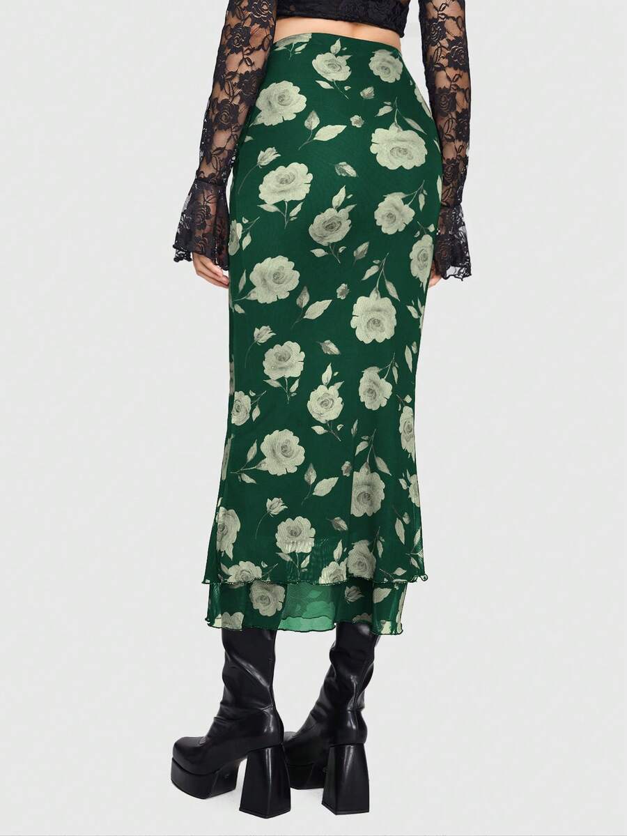 Women's Floral Pattern Mesh Skirt in black featuring a high waist, long mermaid cut, side split, and ruffle lettuce trim.