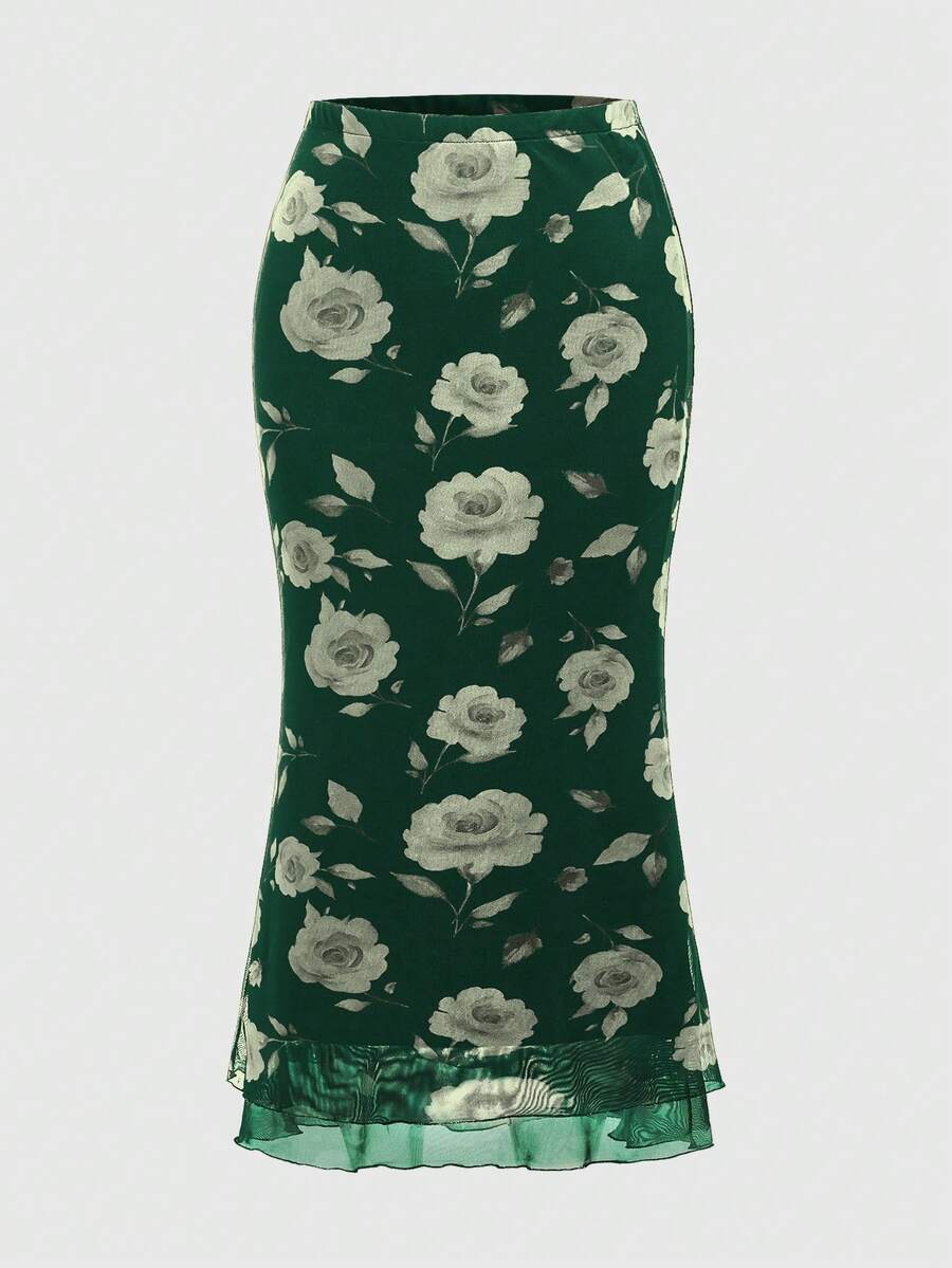 Women's Floral Pattern Mesh Skirt in black featuring a high waist, long mermaid cut, side split, and ruffle lettuce trim.