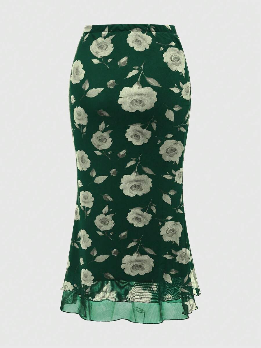 Women's Floral Pattern Mesh Skirt in black featuring a high waist, long mermaid cut, side split, and ruffle lettuce trim.