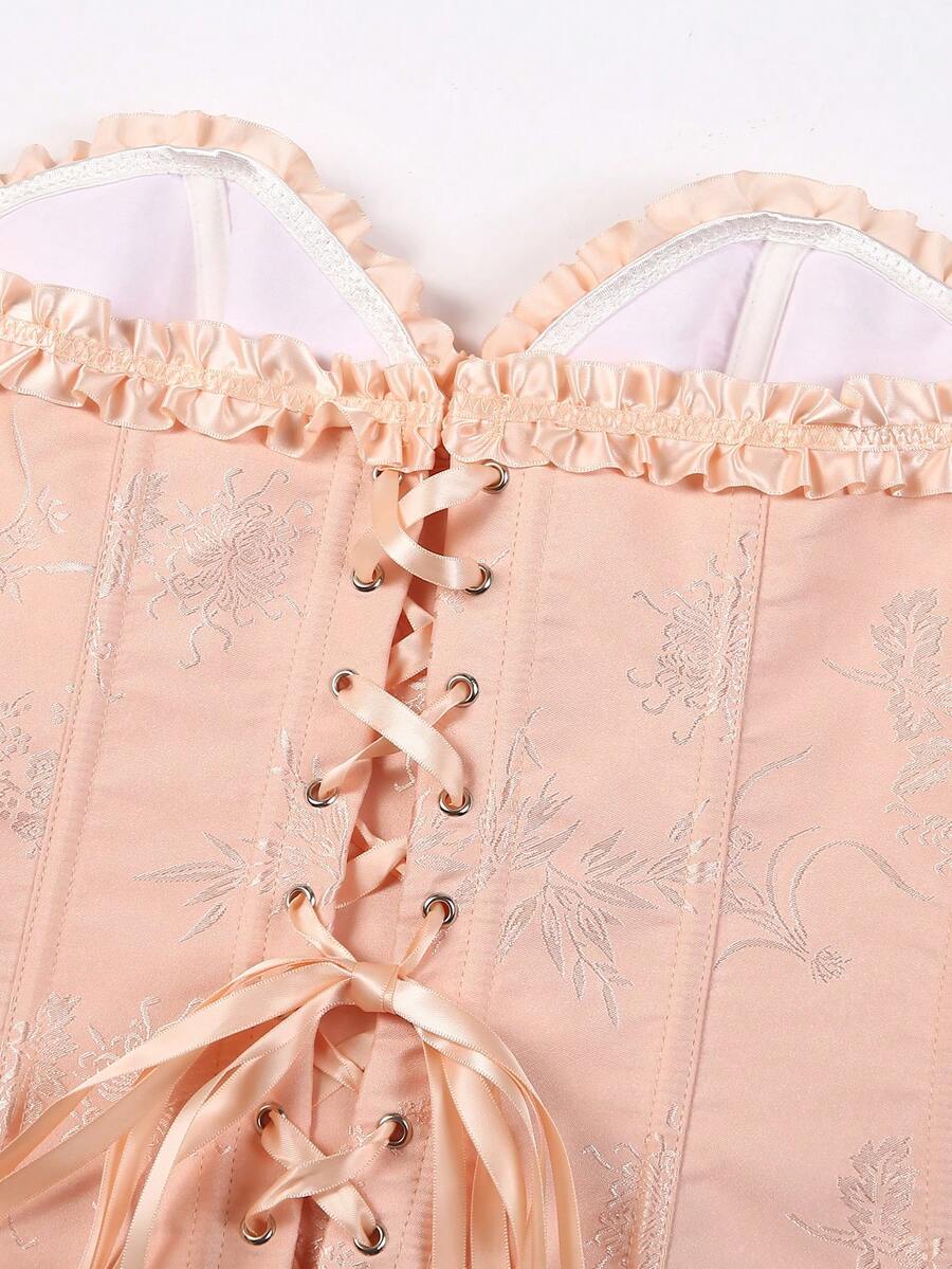 Women’s strapless corset bustier top with front button detail, lace-up back, frill accents, slim fit, and asymmetrical hem.