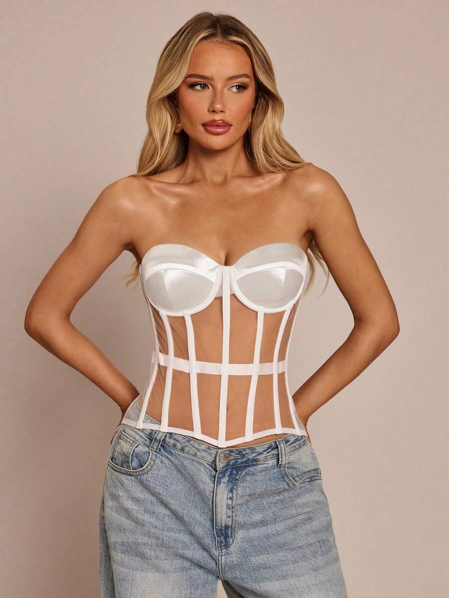 Women's black mesh patchwork bustier corset crop top with sweetheart neckline and asymmetrical hem.